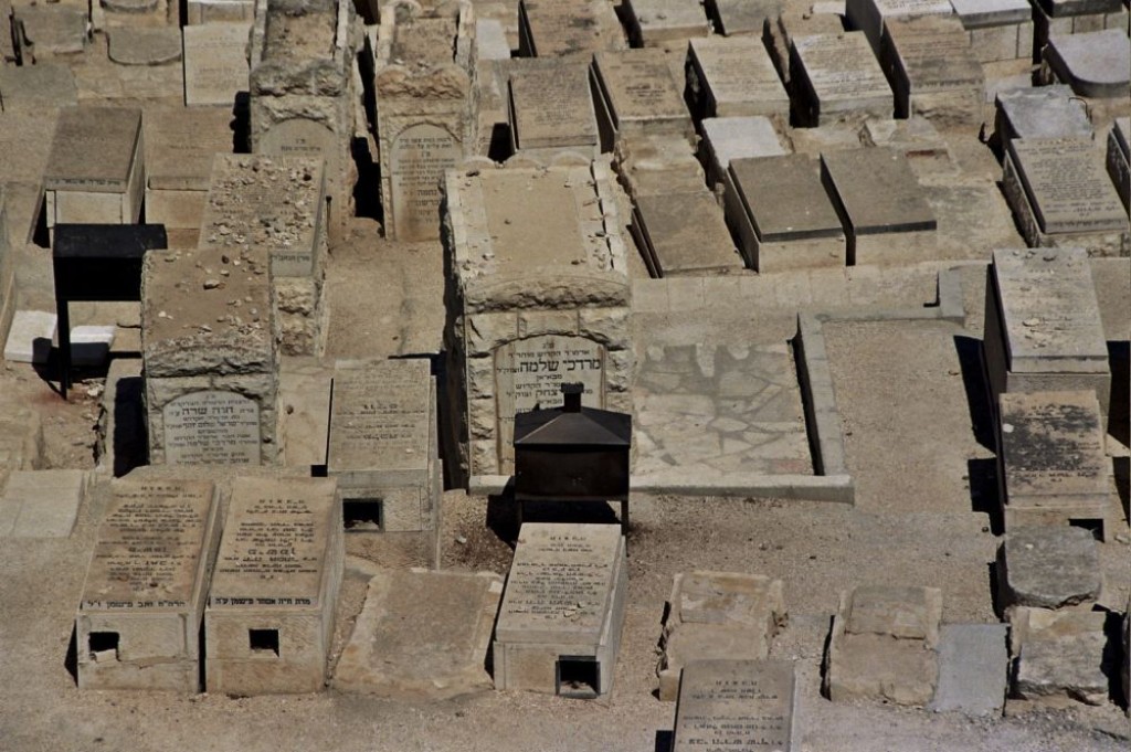 View of the Jewish Cemetary on the Mount of Olives.  The stones on the graves are placed by mourners in rememberance of those who have passed away.